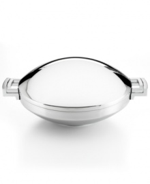 At your service. Your go-to for going big in the kitchen, this versatile wok is the perfect everyday chef's companion with rounded, high sides, a flavor-trapping lid and a large, flat surface ideal for stir fry, steamed veggies, roasted meats and more. The durable stainless steel construction works on all stovetops and slips right in the dishwasher. Limited lifetime warranty. At your service. Your go-to for going big in the kitchen, this versatile wok is the perfect everyday chef's companion with rounded, high sides, a flavor-trapping lid and a large, flat surface ideal for stir fry, steamed veggies, roasted meats and more. The durable stainless steel construction works on all stovetops and slips right in the dishwasher. Limited lifetime warranty.