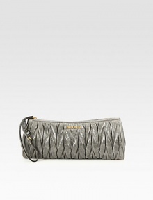 Ruched calfskin zip-top design with an adjustable wristlet strap.Adjustable wristlet strap, 5¼-5¾ dropTop zip closureCotton lining9W X 4¼H X 1¼DMade in Italy Ruched calfskin zip-top design with an adjustable wristlet strap.Adjustable wristlet strap, 5¼-5¾ dropTop zip closureCotton lining9W X 4¼H X 1¼DMade in Italy