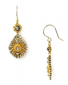 Miguel Ases' gold-flecked earrings are a glamourous take on beads. Equal parts delicate and dramatic, these shapely teardrops beg for a bold lip and slinky gown.