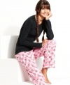 All your bases for a cozy winter are covered with these perfectly adorable pajamas by Jenni. A soft cotton top and and cute printed pants are all you need!