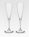 A timeless silhouette is crafted with classic lines and brilliant clarity in pure lead crystal. From the Dom Perignon Collection Set of 2 5.25 oz. 9¼ high Hand wash Made in France