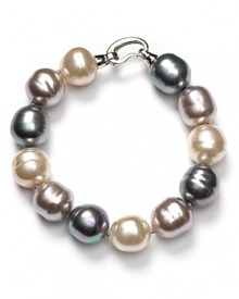 Majorica's multi-colored pearl bracelet turns the look of your basic black dress into something really special. Majorica's multi-colored pearl bracelet turns the look of your basic black dress into something really special.