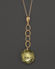 Oval freeform lemon citrine briolettes add rich sparkle to links of 14K yellow gold. By Nancy B. Oval freeform lemon citrine briolettes add rich sparkle to links of 14K yellow gold. By Nancy B.