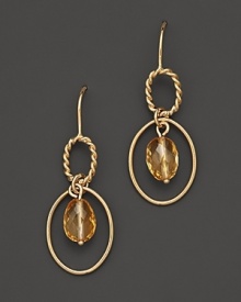 Faceted oval citrine adds rich sparkle to links of 14K yellow gold. By Nancy B.