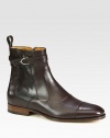 Leather bootie with silver stirrup detail.Side zip closureLeather soleMade in Italy