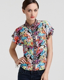 This flirty flutter sleeve blouse from Nanette Lepore combines a garden party print with a flattering, modern fit for spring-perfect style. This flirty flutter sleeve blouse from Nanette Lepore combines a garden party print with a flattering, modern fit for spring-perfect style.