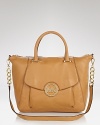 Daytime style gets polished with this sophisticated leather satchel from MICHAEL Michael Kors. In a versatile shape, this bag goes from work to weekends without a slip in style.