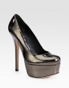 A strut-worthy metallic leather pump with an exaggerated platform and towering heel. Self-covered heel, 5¾ (145mm)Covered platform, 1¾ (45mm)Compares to a 4 heel (100mm)Metallic leather upperLeather lining and solePadded insoleImported