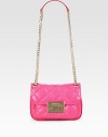 A versatile chain strap tops off this chic flap-top design made of sumptuous quilted lambskin leather. Adjustable chain and leather shoulder strap, 13½-25½ dropPush-lock on front flapLock closure on front flapOne outside open pocket under flapOne inner zip compartmentOne inside zip pocketOne inside open pocket6 credit card slotsLogo-printed lining7¾W X 5½H X 2¾DImported