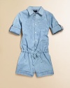 A classic chambray workshirt transforms into a casual, playful romper, featuring a drawstring waist, rolled-up sleeves and a cuffed hem.Spread collar with button frontLong sleeves with single button cuffs and interior button straps for rollingRear elasticized waist with drawstring frontPatch pockets at chest and on-seam hand pocketsCuffed hemCottonMachine washImported