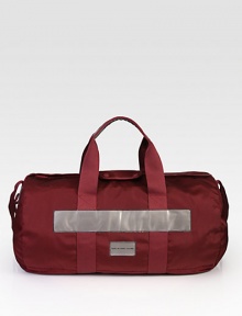 Grab and go to the gym or for an extended weekend getaway, with this sturdy nylon duffel.Zip closureTop handlesAttached shoulder strapInterior zip pocketThree interior slip compartmentsFully linedNylon20½W x 12½H x 10½DImported Grab and go to the gym or for an extended weekend getaway, with this sturdy nylon duffel.Zip closureTop handlesAttached shoulder strapInterior zip pocketThree interior slip compartmentsFully linedNylon20½W x 12½H x 10½DImported
