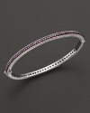 Pink sapphires stud a sterling silver bangle from Judith Ripka.