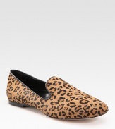 Spirited spots on luxe haircalf, trimmed with leather in a chic and casual shape.Round toe Leather lining and sole Padded insole ImportedOUR FIT MODEL RECOMMENDS ordering one half size up as this style runs small. 