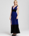 Opt for modern glamour in this floor-sweeping BCBGMAXAZRIA gown, boasting a striking two-tone color scheme.