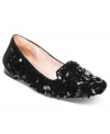 Vince Camuto's Loria smoking flats feature all-over sequins for a look that's as festive as it is luxurious.