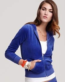 Embrace the weekend in this Juicy Couture velour hoodie--a luxe addition to your laid-back style.