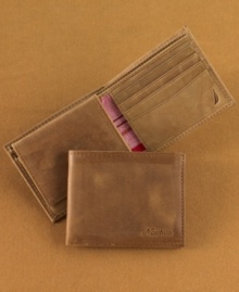 In subtly distressed leather, this expandable passcase wallet from Nautica combines classic style with modern convenience. In subtly distressed leather, this expandable passcase wallet from Nautica combines classic style with modern convenience.