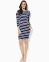 A sleek-fitting cotton jersey dress is steeped in nautical inspiration and finished with allover horizontal stripes and a chic rope belt.