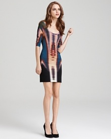 A psychedelic print infuses this Nicole Miller dress with cool while a sultry cutout back reveals a hint of skin.