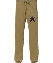Laid back looks get an ultra cool edge in Jet Sets sporty star print pants, detailed with elasticized cuffs and a drawstring waistline for that effortless rugged edge - Drawstring waistline, side slit pockets, back patch pockets, star print on thigh, fine ribbed cuffs - Casual, baggy fit - Wear with cozy flannels and shearling-lined weather boots Laid back looks get an ultra cool edge in Jet Sets sporty star print pants, detailed with elasticized cuffs and a drawstring waistline for that effortless rugged edge - Drawstring waistline, side slit pockets, back patch pockets, star print on thigh, fine ribbed cuffs - Casual, baggy fit - Wear with cozy flannels and shearling-lined weather boots