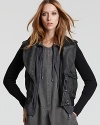 Edgy knit sleeves with cool-girl details lend downtown flair to this Burberry Brit leather jacket.