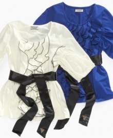 Bring out her girlie side with this lovely ruffled shirt from Guess. Bring out her girlie side with this lovely ruffled shirt from Guess.