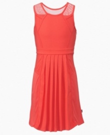 Hot style with a cool design, sheer mesh overlays on the shoulders of this DKNY dress add a unique twist. Hot style with a cool design, sheer mesh overlays on the shoulders of this DKNY dress add a unique twist.