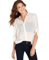 Flourished in rhinestones and sporting a cool high-low hem, this three-quarter sleeve blouse from Ali & Kris is a glam update to the popular sheer button-down!