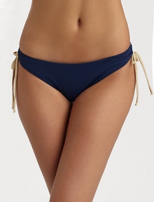Sleek stretch nylon knit with soft ruching and contrast side ties.Elastic waistband Side ruching with contrast ties Fully lined 80% nylon/20% spandex Fully lined Hand wash Made in USAPlease note: Bikini top sold separately. Sleek stretch nylon knit with soft ruching and contrast side ties.Elastic waistband Side ruching with contrast ties Fully lined 80% nylon/20% spandex Fully lined Hand wash Made in USAPlease note: Bikini top sold separately.