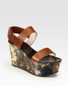 Lustrous silk wedge in a lovely watercolor print, topped with smooth leather straps and an adjustable slingback. Silk-covered wedge, 3½ (90mm)Silk-covered platform, 2 (50mm)Compares to a 1½ heel (40mm)Leather upperLeather liningRubber soleImportedOUR FIT MODEL RECOMMENDS ordering true size. 