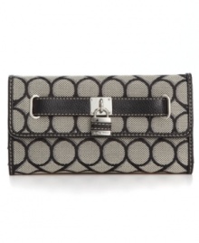 Although detailed with a classic 9 signature print, this Nine West style is a definite 10. With shiny silvertone hardware and plenty of interior compartments, this classic style will keep you chic and organized. Although detailed with a classic 9 signature print, this Nine West style is a definite 10. With shiny silvertone hardware and plenty of interior compartments, this classic style will keep you chic and organized.