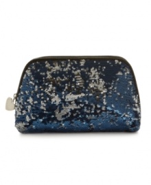 Dazzling with multicolored sequins, this cosmetic bag from Nine West is glam whether your look is day or night. Dazzling with multicolored sequins, this cosmetic bag from Nine West is glam whether your look is day or night.
