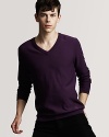 Long sleeve v-neck sweater with check shoulder patches. Finely ribed cuffs and hem.