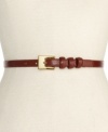 Sink your fangs into this exotic skinny belt from Nine West. Stylish faux-snake detail will keep you on-trend this season.