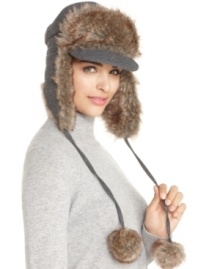 Nine West combines two hot trends - the captain brim and the trooper style - and adds cute pom-poms for a look that's stylish, warm and fun. Nine West combines two hot trends - the captain brim and the trooper style - and adds cute pom-poms for a look that's stylish, warm and fun.