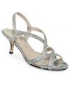 Strappy and sparkly. The Ester evening sandals by Caparros will dress up your outfit in a way that's easy on your feet.