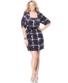 Jessica Simpson's plus size blouson-style dress is outfitted with an adorable, contour-creating bow belt and a dynamic print.