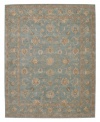 Bring new distinction to your home. Marked by its delicate aqua color palette and luxuriously soft texture, this handcrafted rug recreates the elegance of 17th Century Persian carpets. Hard-twist yarns are specially dyed for a subtlety of coloration producing a vintage look similar to traditional vegetable dyes.