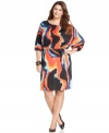 Be a stylish standout in Cha Cha Vente's printed plus size dress, accentuated by a belted waist.