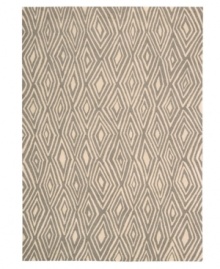 Diamond cut. A distinctive all-over diamond design and charcoal gray background evoke the rings from the trunk of an ancient tree. Hand tufted from 100% natural wool, this plush Calvin Klein rug is crafted using the cut-and-loop pile technique that creates a unique matte surface texture. Diamond cut. A distinctive all-over diamond design and charcoal gray background evoke the rings from the trunk of an ancient tree. Hand tufted from 100% natural wool, this plush Calvin Klein rug is crafted using the cut-and-loop pile technique that creates a unique matte surface texture.