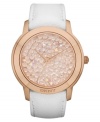 A fresh watch design from DKNY with eye-catching rosy-hued stones at the dial.