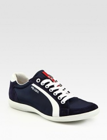 Sleek design with a sporty attitude in a smooth suede and nylon finish.Nylon/suede upperLeather liningPadded insoleRubber soleMade in Italy Sleek design with a sporty attitude in a smooth suede and nylon finish.Nylon/suede upperLeather liningPadded insoleRubber soleMade in Italy