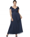 Evening elegance, from Alex Evenings. This plus size gown features graceful draping and a sparkling beaded waistband!