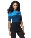 INC's colorblocked tunic sweater makes an easy way to update your closet with fall's hottest trend!