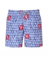 Make a splash this summer with cult St. Tropez label Vilebrequins eye-catching blue swim trunks - Lightweight, fast-drying synthetic material - Chic, red floral embroidery - Classic boxer cut with elasticated waist and drawstring tie - Slimmer, straight cut hits mid-thigh - Slash pockets at sides, welt pocket at rear - Perfect for your next getaway to the beach or the pool - Special edition