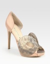 Timeless satin peep toe design enhanced by a masquerade-inspired bronzed snakeskin detail and covered platform. Self-covered heel, 4½ (115mm)Covered platform, ½ (15mm)Compares to a 4 heel (100mm)Satin and bronzed snakeskin upperLeather lining and solePadded insoleMade in ItalyOUR FIT MODEL RECOMMENDS ordering one half size up as this style runs small. 