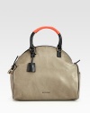 An impeccably structured bag of sumptuous leather, finished with sporty details and pebbled trim.Double top handles, 3¼ dropTop zip closureProtective metal feetTwo outside open pocketsOne inside zip pocketOne inside open pocketFully lined12½W X 11¼H X 6DMade in Italy