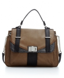 With an of-the-moment look as bold as your ideas, the Risky Business bag combines fashion-forward details with a smart business-chic functionality. With an of-the-moment look as bold as your ideas, the Risky Business bag combines fashion-forward details with a smart business-chic functionality.