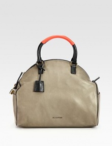 An impeccably structured bag of sumptuous leather, finished with sporty details and pebbled trim.Double top handles, 3¼ dropTop zip closureProtective metal feetTwo outside open pocketsOne inside zip pocketOne inside open pocketFully lined12½W X 11¼H X 6DMade in Italy An impeccably structured bag of sumptuous leather, finished with sporty details and pebbled trim.Double top handles, 3¼ dropTop zip closureProtective metal feetTwo outside open pocketsOne inside zip pocketOne inside open pocketFully lined12½W X 11¼H X 6DMade in Italy