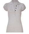 A feminine choice with its deep V-neckline and sweet puffed short sleeves, Burberry Brits polo shirt is a stylish way to dress up your basics - Spread collar, V-neckline, puffed short sleeves, partial button placket with characteristic check trim - Form-fitting - Channel preppy style and wear with jeans and bright loafers